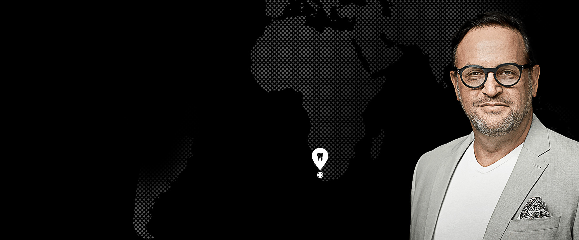 Prof. Howard Gluckman vor der Weltkarte der USTOMED Scientific Partner, Kapstadt, Südafrika
